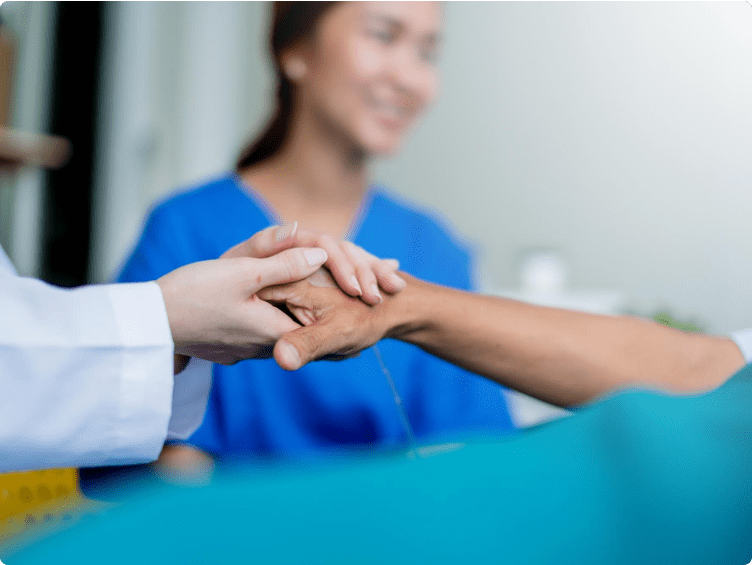 Doctor Holds Patient Hand