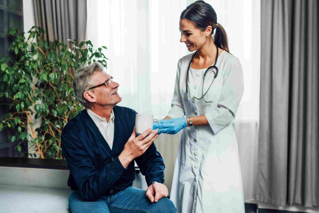 Photo Happy Female Doctor Giving Water Her Patient Nursing Home Assistant Help